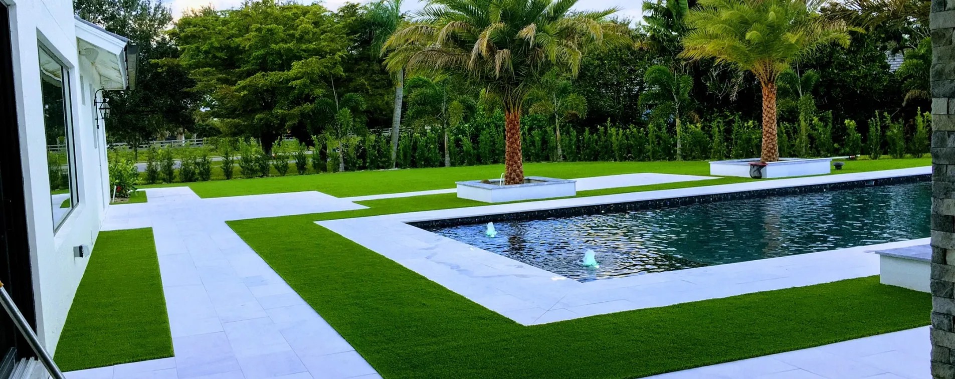 Poolside Perfection in Sarasota: Why Synthetic Grass Wins Over Concrete and Real Sod
